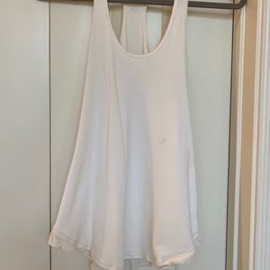Lululemon ivory ruffle bottom tank size 4